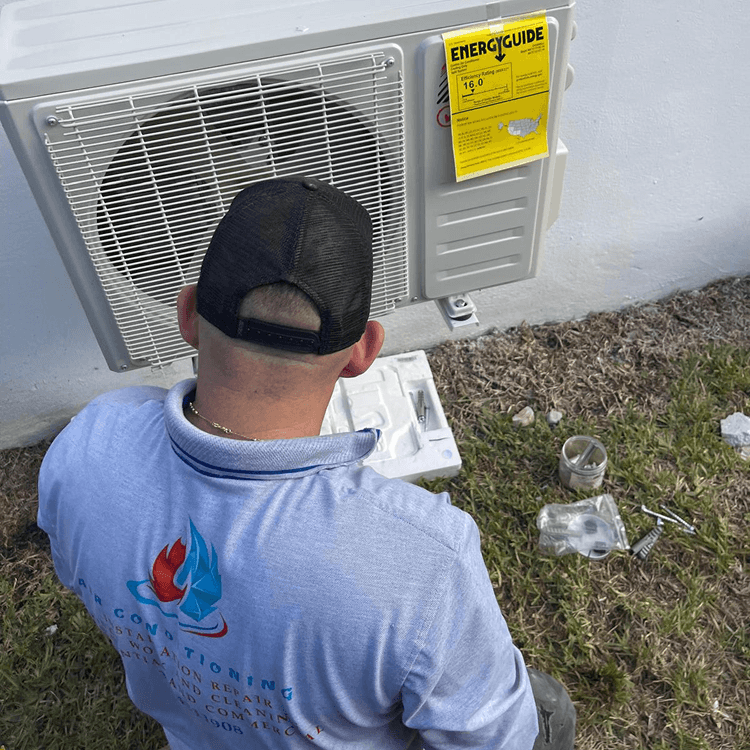 Licensed Hopeflex technicians servicing HVAC equipment in Miami